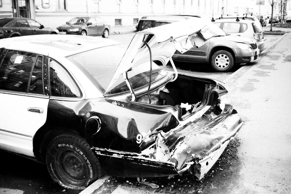 A physician documenting exam findings on a patient recovering from a car accident.