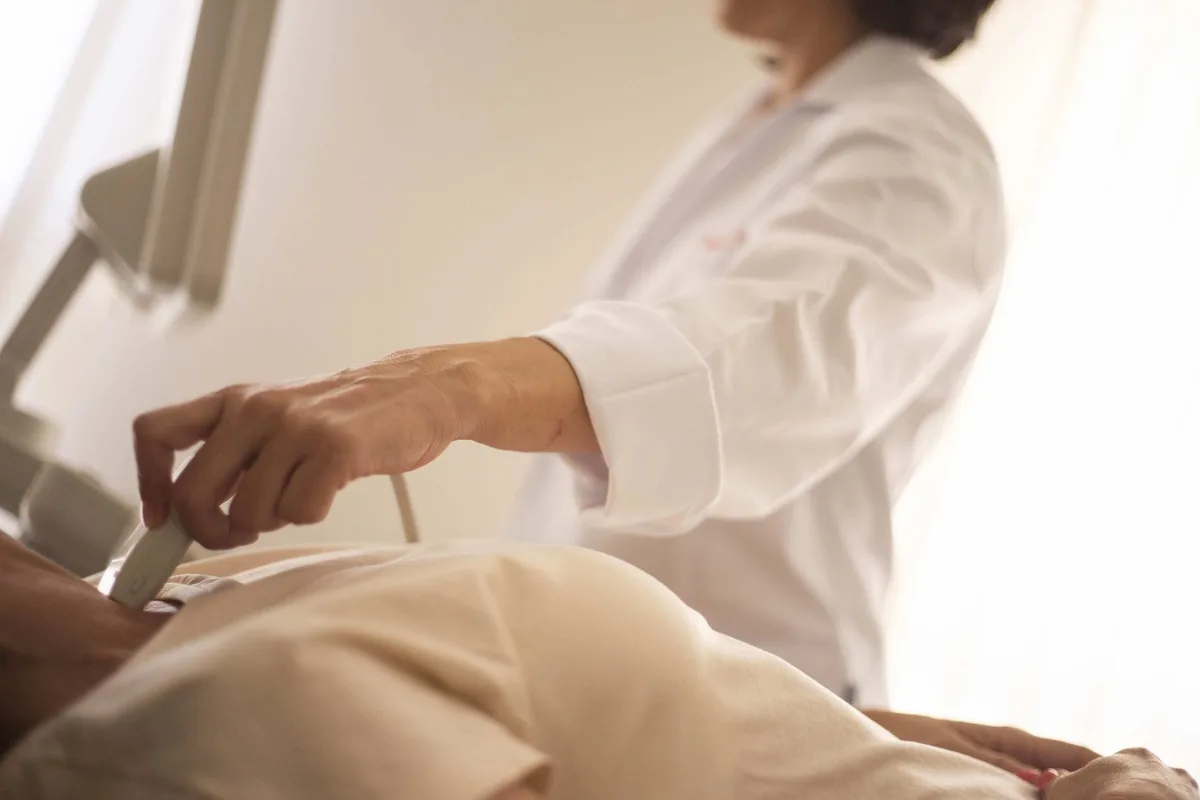 An ultrasound-guided percutaneous lead being placed near a peripheral nerve for nerve stimulation.